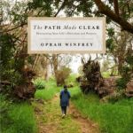 The Path Made Clear cover - image of Oprah walking in the woods