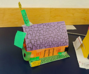construction paper house built by FYRE Initiative participant