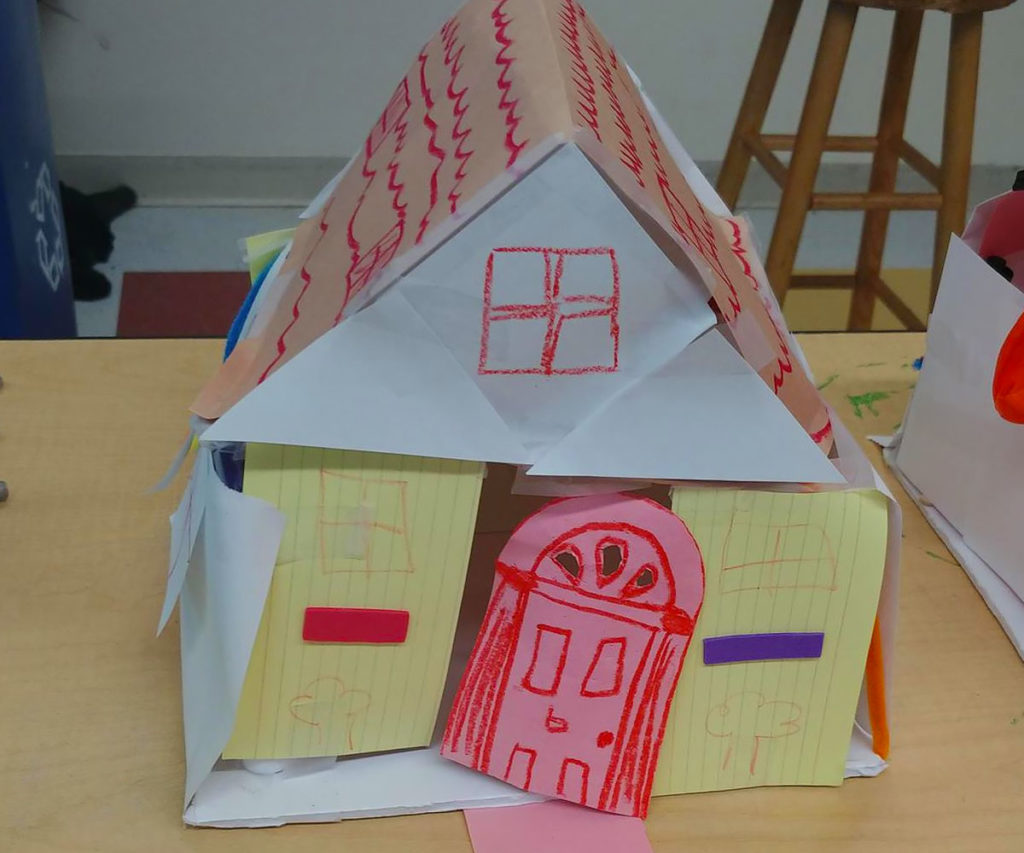 construction paper houses built by FYRE Initiative participant